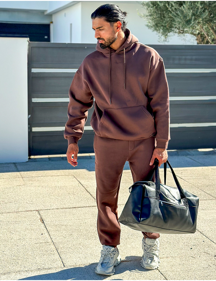 Ensemble molletonné pantalon et sweat à capuche uni