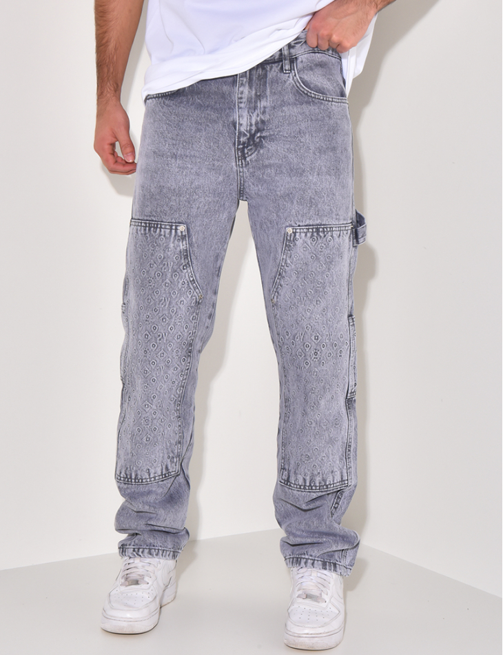 Jeans avec empiècements à motifs en relief