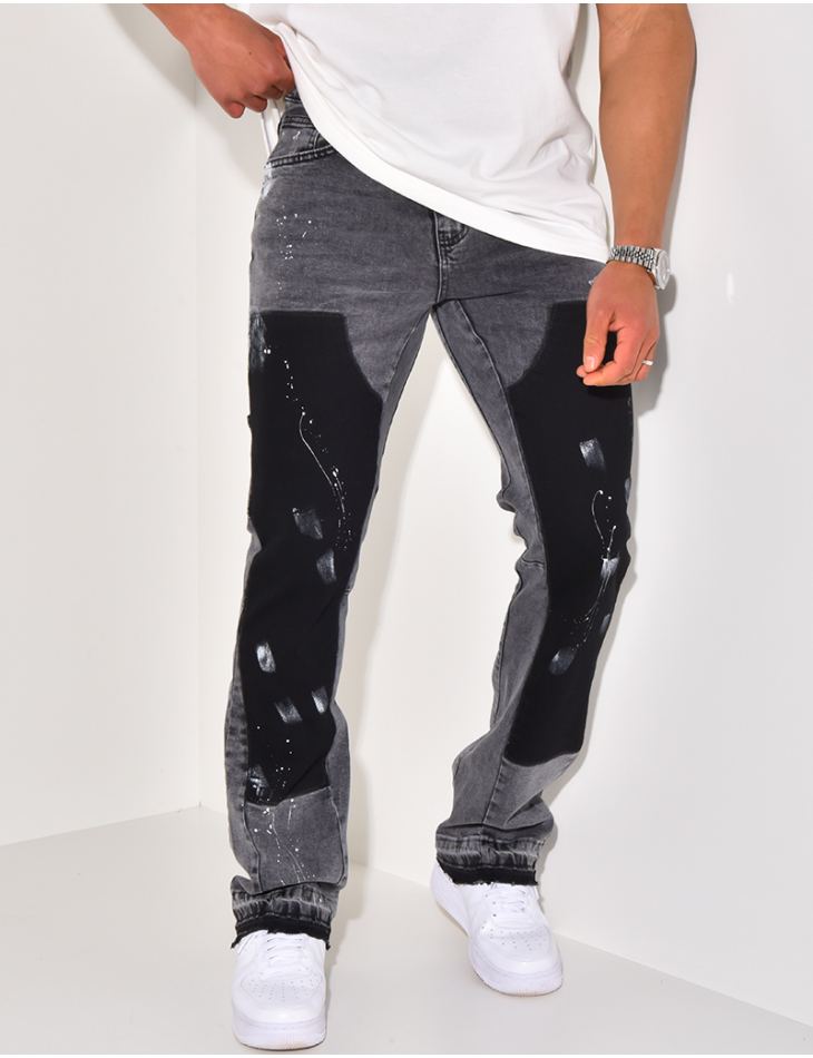 Jeans with panels and stains