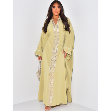 Loose-fitting abaya with embroidered gold ties