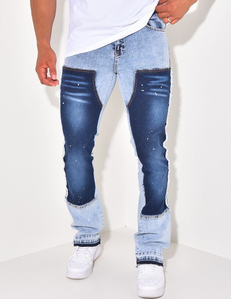 Jeans large a fermeture eclaire aux chevilles