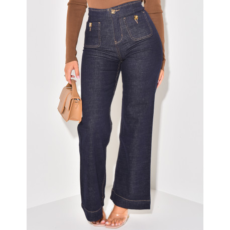 Raw stretchy flare jeans with buttoned pockets