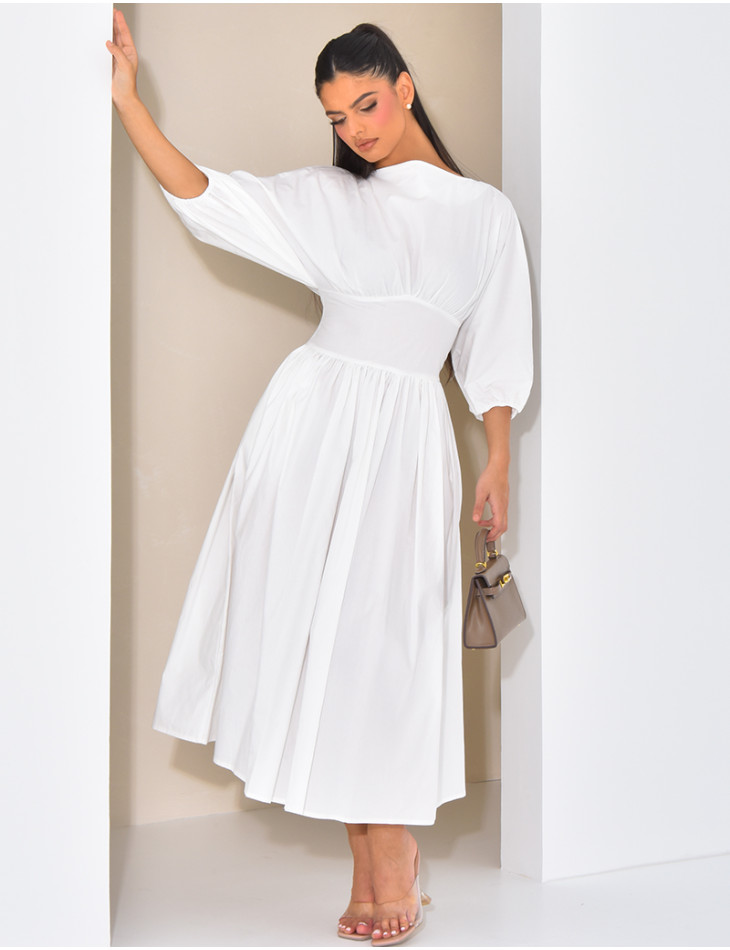 Long cotton dress fitted at the waist