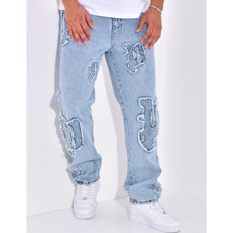 Jeans mit Destroyed-Schriftzug